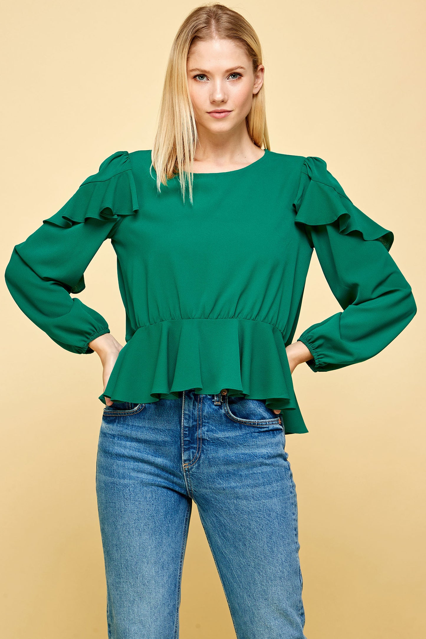 RUFFLED DETAIL PEPLUM TOP IN EMERALD