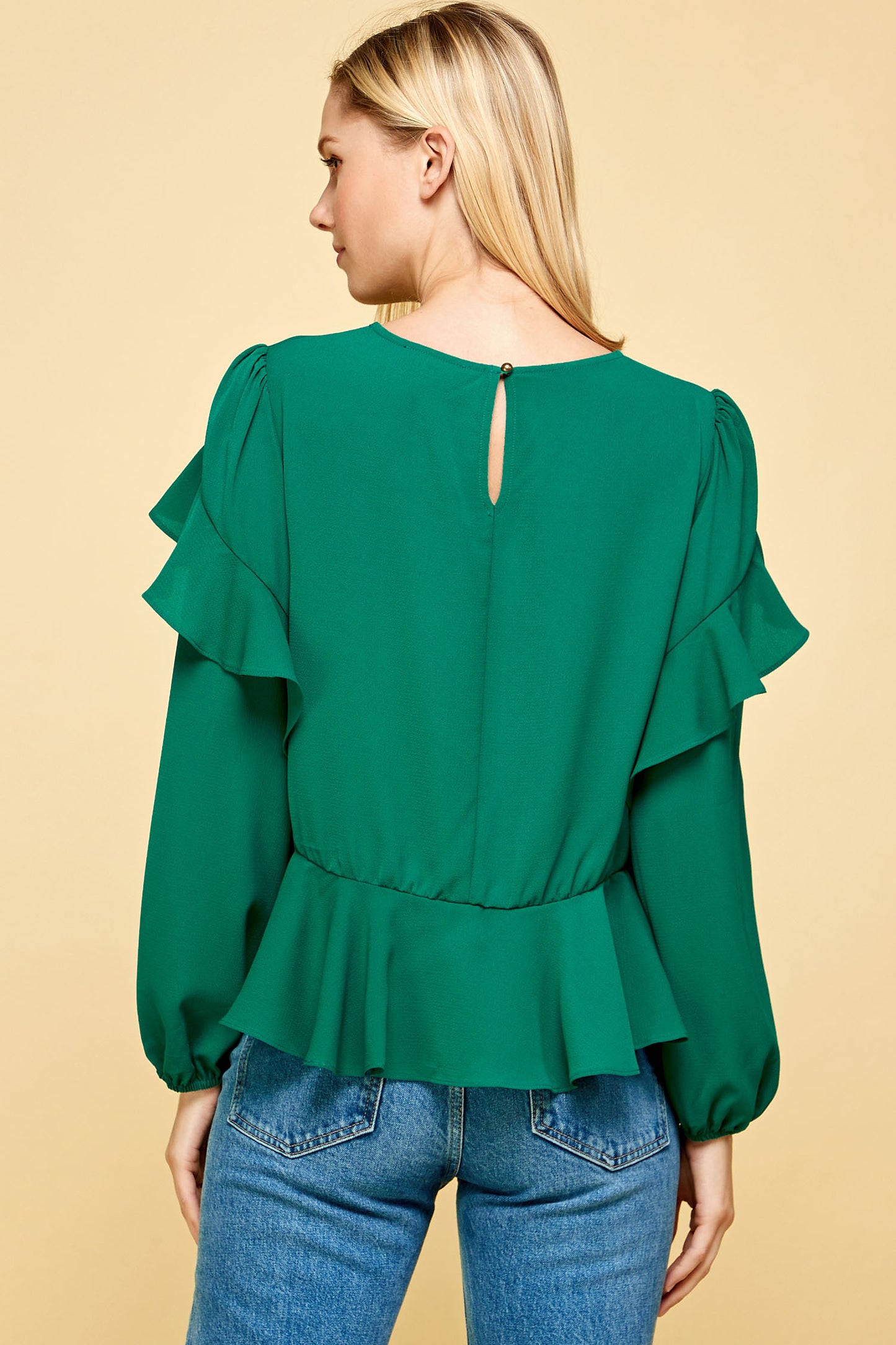 RUFFLED DETAIL PEPLUM TOP IN EMERALD
