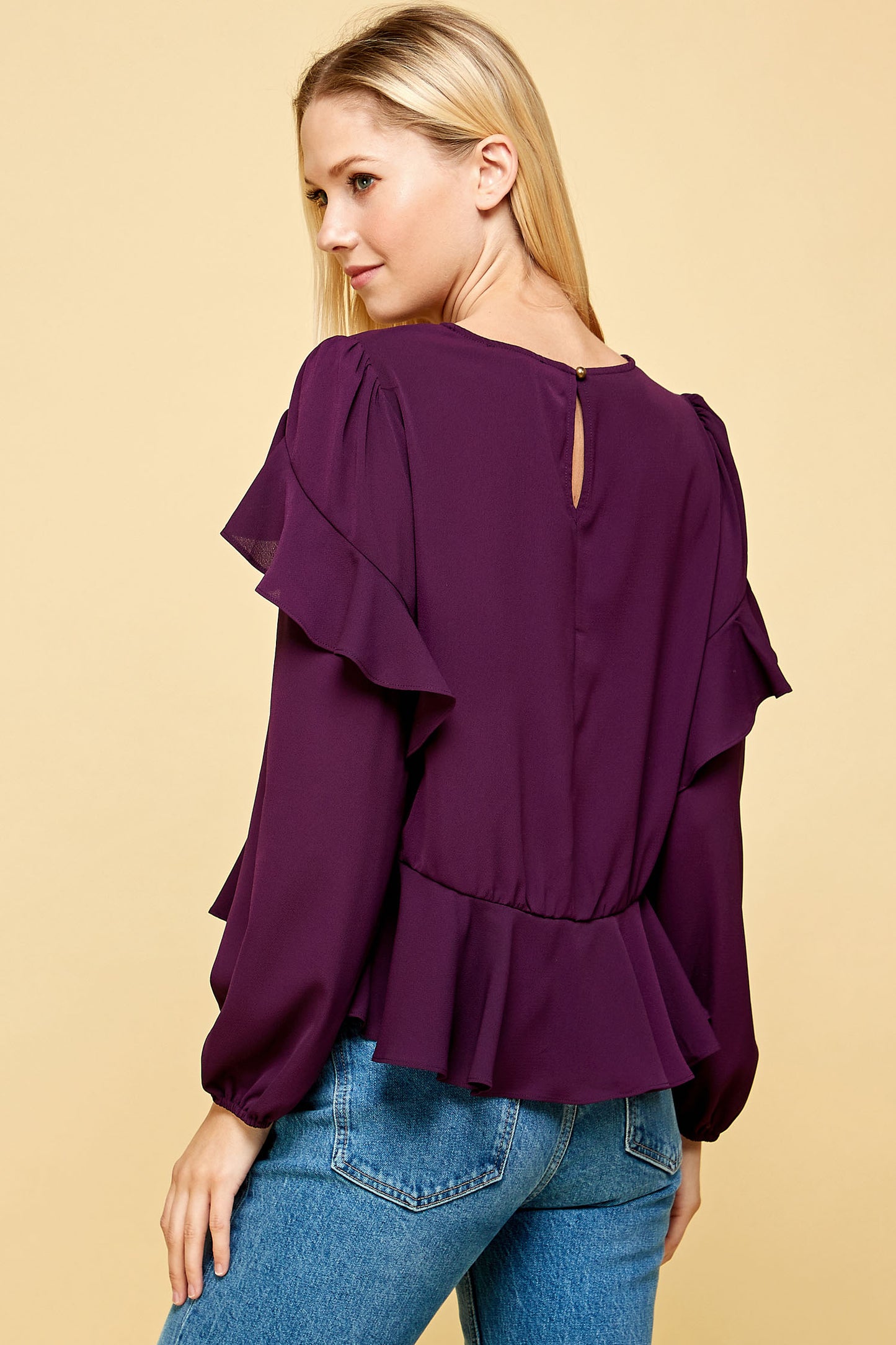 RUFFLED DETAIL PEPLUM TOP IN PURPLE