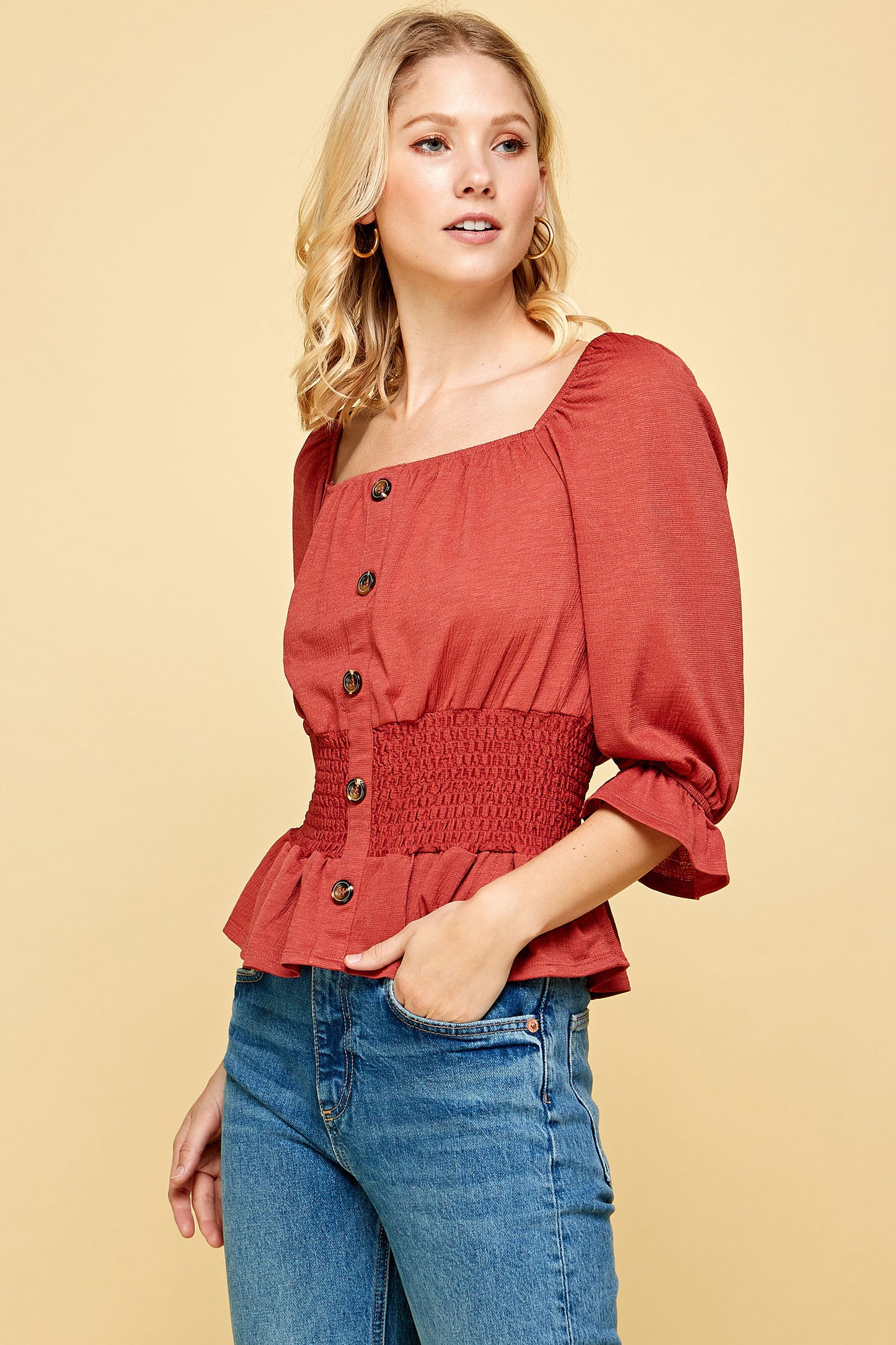 BUTTON DOWN SMOCKED PEPLUM TOP IN RUST