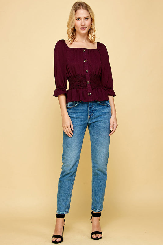 BUTTON DOWN SMOCKED PEPLUM TOP IN MERLOT