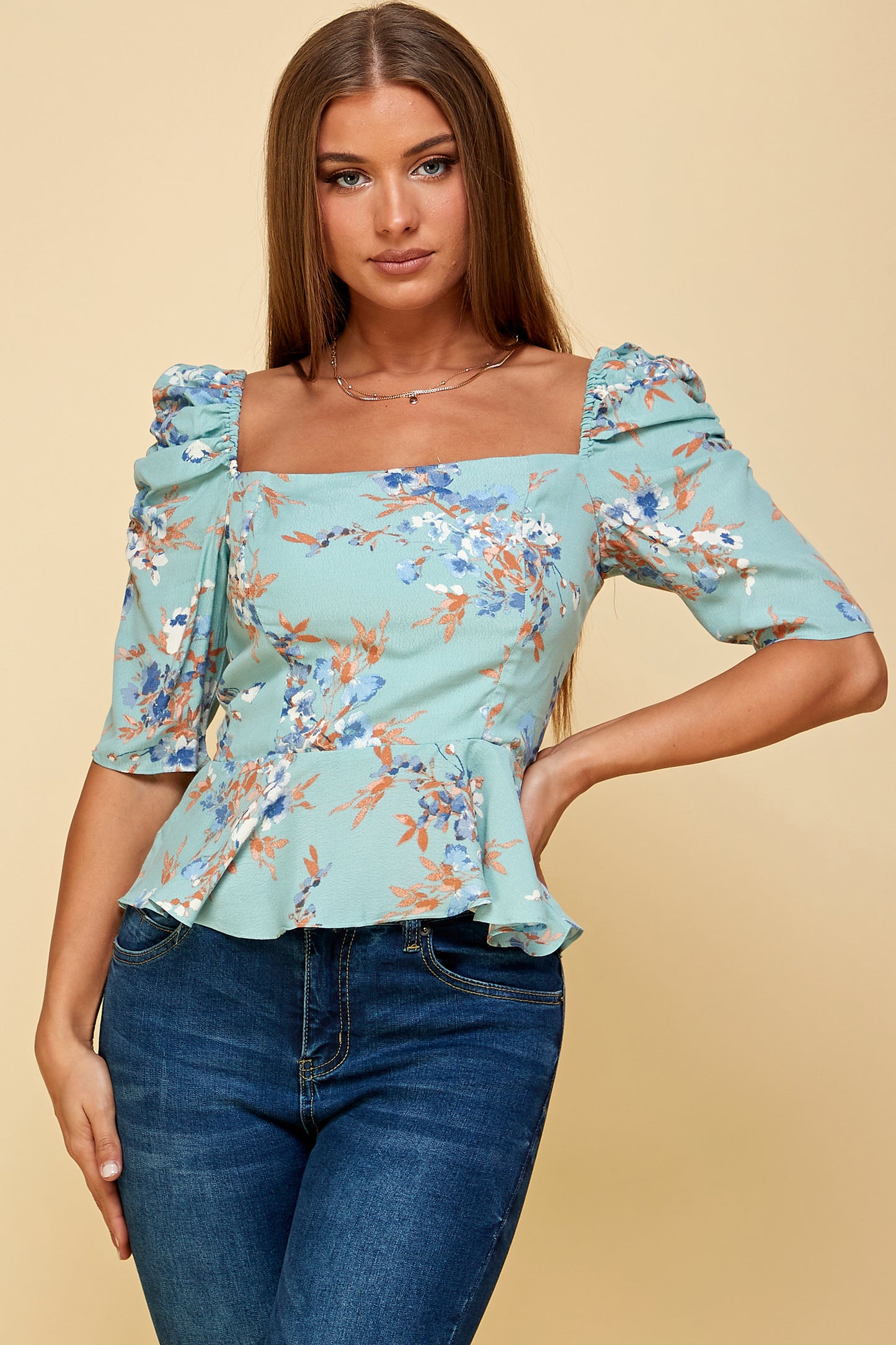 FLORAL PEPLUM TOP WITH 3/4 SLEEVES