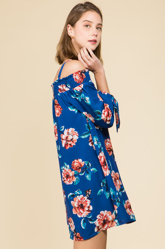 SMOCKED OFF SHOULDER FLORAL DRESS WITH ADJUSTABLE TIE STRAPS