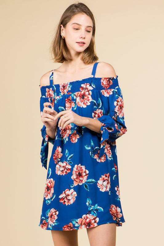 SMOCKED OFF SHOULDER FLORAL DRESS WITH ADJUSTABLE TIE STRAPS