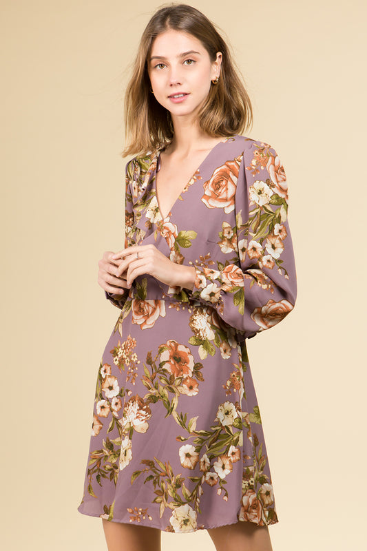 ASYMMETRICAL RUFFLE V-NECK OPEN BACK MINI DRESS IN ROSE PRINT